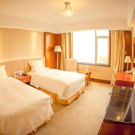Weihai Golden Bay International Hotel Esterno foto